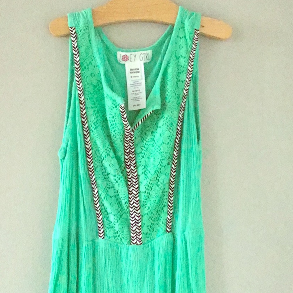 Two piece set, includes shirt and shorts.